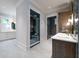 Spa-like bathroom with a walk-in shower and double vanity at 3244 Stillhouse Rd, Atlanta, GA 30339