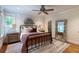 Cozy bedroom with metal bed frame and rustic nightstand at 3244 Stillhouse Rd, Atlanta, GA 30339