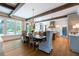 Spacious dining area with hardwood floors and exposed wooden beams at 3244 Stillhouse Rd, Atlanta, GA 30339