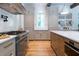 Bright kitchen features a large island and professional-grade range at 3244 Stillhouse Rd, Atlanta, GA 30339