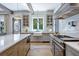 Gourmet kitchen boasts expansive island, high-end appliances, and ample cabinetry at 3244 Stillhouse Rd, Atlanta, GA 30339