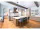 Island kitchen with white countertops and gray cabinets at 3244 Stillhouse Rd, Atlanta, GA 30339