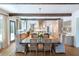 Modern kitchen with large island, exposed beams, and ample cabinetry at 3244 Stillhouse Rd, Atlanta, GA 30339
