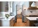 Open kitchen with butler's pantry and charming message board at 3244 Stillhouse Rd, Atlanta, GA 30339