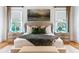 Bright and airy main bedroom with a cozy sitting area at 3244 Stillhouse Rd, Atlanta, GA 30339