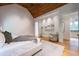 Large main bedroom with sitting area and access to bathroom at 3244 Stillhouse Rd, Atlanta, GA 30339