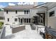 Outdoor kitchen with grill and seating area at 3244 Stillhouse Rd, Atlanta, GA 30339