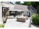 Outdoor patio with seating area and built-in grill at 3244 Stillhouse Rd, Atlanta, GA 30339