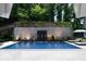 Inviting swimming pool with surrounding patio and landscaping at 3244 Stillhouse Rd, Atlanta, GA 30339