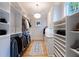 Spacious walk-in closet with ample shelving and hanging space at 3244 Stillhouse Rd, Atlanta, GA 30339