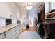 Bright walk-in closet with custom built-ins and wood flooring at 3244 Stillhouse Rd, Atlanta, GA 30339