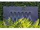 Modern water feature with cascading water and lush greenery at 3244 Stillhouse Rd, Atlanta, GA 30339
