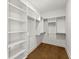 Large walk-in closet with ample shelving and hanging space at 216 Wakehurst Way, Marietta, GA 30064