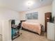 Cozy bedroom with built-in workspace and neutral decor at 1328 Stone Bay Sw Dr, South Fulton, GA 30331