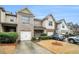 Townhome exterior showcasing multiple units and landscaping at 1328 Stone Bay Sw Dr # 282, South Fulton, GA 30331