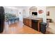 Kitchen with dark wood cabinets and black appliances at 1328 Stone Bay Sw Dr, South Fulton, GA 30331