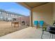 Private patio with seating, grill, and fenced backyard at 1328 Stone Bay Sw Dr, South Fulton, GA 30331