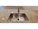 Modern kitchen sink with stainless steel basin and granite countertop at 2343 Buford Town Dr, Buford, GA 30518