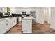 Updated kitchen featuring white cabinets, quartz countertops, and stainless steel appliances at 2473 Baker Rd, Atlanta, GA 30318
