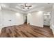 Main bedroom with ensuite bathroom and hardwood floors at 2473 Baker Rd, Atlanta, GA 30318