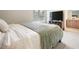 Main bedroom with large bed and access to bathroom at 6412 Wedgeview Dr, Tucker, GA 30084