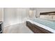 Main bedroom with large bed and walk-in closet at 6412 Wedgeview Dr, Tucker, GA 30084