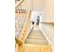 View from the top of carpeted stairs leading down at 6412 Wedgeview Dr, Tucker, GA 30084