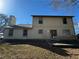 Back of the house showing two stories and siding at 1402 Chelsea Downs Ne Ln, Conyers, GA 30013