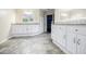 Bathroom with double vanity and granite countertops at 5490 Powers Overlook Ct, Atlanta, GA 30327