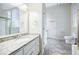 Bathroom with granite countertop and tiled floor at 5490 Powers Overlook Ct, Atlanta, GA 30327