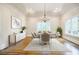 Elegant dining room with hardwood floors and chandelier at 5490 Powers Overlook Ct, Atlanta, GA 30327