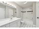 Clean basement bathroom with a shower/tub combo at 7130 Fawn Lake Dr, Alpharetta, GA 30005