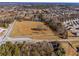 Aerial view of a large lot near a pond at 3935 Loganville Hwy, Loganville, GA 30052