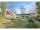 Spacious backyard with shed and mature trees at 3935 Loganville Hwy, Loganville, GA 30052