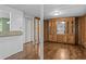 Built-in wooden hutch and hardwood floors in dining area at 3935 Loganville Hwy, Loganville, GA 30052