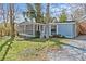 Mobile home with screened porch and yard at 3935 Loganville Hwy, Loganville, GA 30052