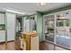 Kitchen with access to screened porch and island at 3935 Loganville Hwy, Loganville, GA 30052