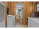 Laundry room with washer, dryer, and extra storage at 3935 Loganville Hwy, Loganville, GA 30052