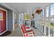 Relaxing screened porch with rocking chairs at 3935 Loganville Hwy, Loganville, GA 30052