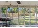 Screened porch overlooking the backyard with a gas grill at 3935 Loganville Hwy, Loganville, GA 30052