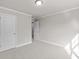 Spacious bedroom features neutral walls, plush carpet, and a hallway entrance at 741 Cams Crk, Mcdonough, GA 30253