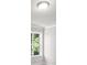 Bedroom corner with window and white trim, offering a bright and airy space at 741 Cams Crk, Mcdonough, GA 30253