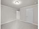 Bedroom features carpet floors, white trim, access to the hallway and large window at 741 Cams Crk, Mcdonough, GA 30253