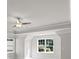 Bedroom featuring windows, carpet flooring, a ceiling fan, and white trim at 741 Cams Crk, Mcdonough, GA 30253