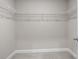 Walk-in closet with carpeted floor and wire shelving at 741 Cams Crk, Mcdonough, GA 30253