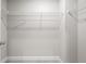 Walk-in closet featuring carpeted floor and wire shelving at 741 Cams Crk, Mcdonough, GA 30253