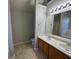 Double vanity bathroom with a tub and shower at 916 Brisley Cir, Hampton, GA 30228