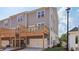 Townhouse exterior with gray siding and a wooden deck at 123 Silvia Ln, Hapeville, GA 30354