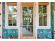 French doors open to a charming backyard with colorful wallpaper at 2188 Niles Pl, Atlanta, GA 30324