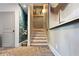 Basement staircase with unique herringbone floors and accent wall at 2188 Niles Pl, Atlanta, GA 30324